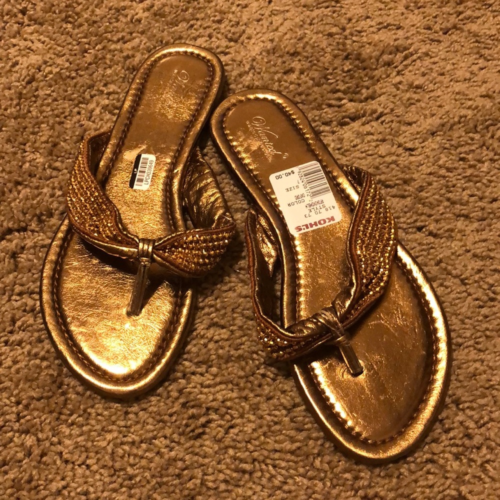 Wanted women’s gold flip flops size 7